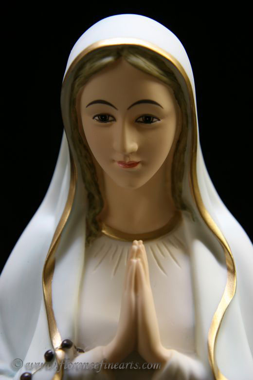 This auction is for a statue of Our Lady of Lourdes. She is absolutely 